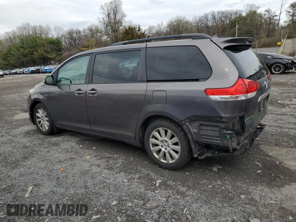 2013 Toyota Sienna XLE with VIN 5TDDK3DC9DS071069, listed as a Copart auction lot 51740015 with 170,277 mi miles and Salvage Title. Bid and sale history available at DreamBid. Image 2.