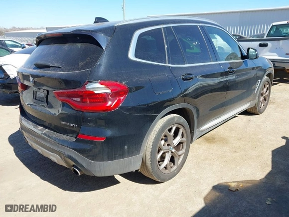 2021 BMW X3 sDrive30i with VIN 5UXTY3C00M9F94174, listed as a IAAI auction lot 41628837 with 53,996 mi miles. Bid and sale history available at carsss.com. Image 4.