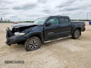 2018 Toyota Tacoma SR5 z VIN 5TFAZ5CN9JX062620, wystawiony jako Copart lot #58948235 z przebiegiem 183 010 mil mil oraz Szkoda całkowita • Salvage title. Historia ofert i sprzedaży dostępna na DreamBid. Obrazek 1.