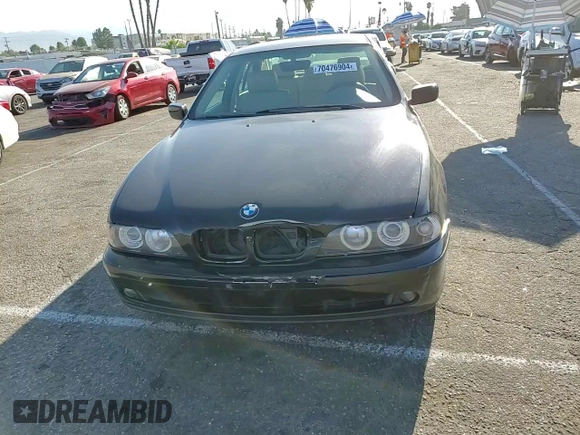 2003 BMW 5 Series 525i with VIN WBADT33433GF43797, listed as a Copart auction lot 70476904 with 194,319 mi miles and Salvage Title. Bid and sale history available at carsss.com. Image 11.