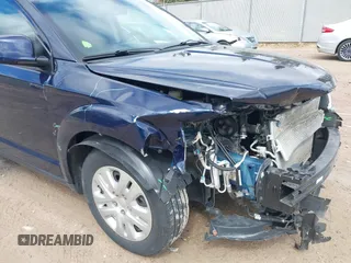 2019 Dodge Journey SE with VIN 3C4PDCBBXKT707700, listed as a IAAI auction lot 42038474 with 57,903 mi miles and . Bid and sale history available at DreamBid. Image 17.