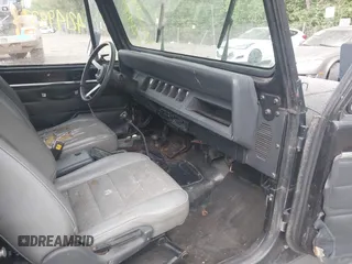 1995 Jeep Wrangler S with VIN 1J4FY19P4SP242027, listed as a IAAI auction lot 42149833 with 158,695 mi miles. Bid and sale history available at carsss.com. Image 5.
