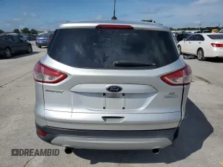 2013 Ford Escape SE с VIN 1FMCU0G9XDUA41798, выставлен на аукционе Copart как лот 57460025 с пробегом 137 816 миль миль и Списание • Salvage title. История ставок и продаж доступна на DreamBid. Изображение 6.
