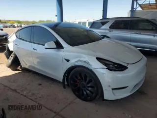 2021 Tesla Model Y Performance z VIN 5YJYGDEF5MF215870, wystawiony jako Copart lot #52531015 z przebiegiem 21 904 mil mil oraz Szkoda całkowita • Salvage title. Historia ofert i sprzedaży dostępna na DreamBid. Obrazek 4.