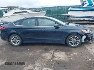 2020 Ford Fusion SE with VIN 3FA6P0HD7LR110180, listed as a IAAI auction lot 42180826 with 151,934 mi miles and . Bid and sale history available at DreamBid. Image 13.