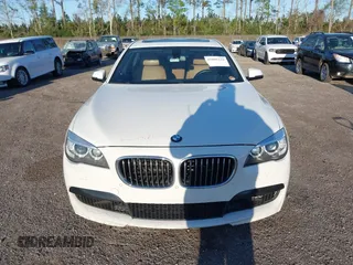 2014 BMW 7 Series ALPINA B7 with VIN WBAYE8C59ED134562, listed as a IAAI auction lot 41806222 with 120,043 mi miles. Bid and sale history available at carsss.com. Image 12.