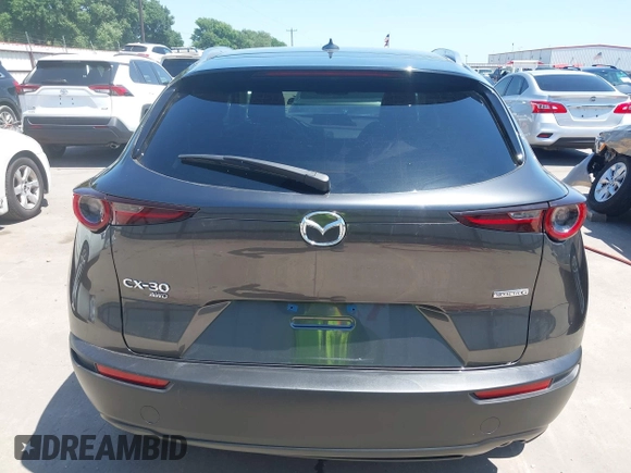 2022 Mazda CX-30 S Premium with VIN 3MVDMBDL5NM416649, listed as a IAAI auction lot 41990745 with 13,923 mi miles and . Bid and sale history available at DreamBid. Image 17.