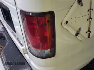 2010 Ford Econoline Cargo Commercial with VIN 1FTNE1EW1ADA90764, listed as a IAAI auction lot 42608095 with 146,335 mi miles and . Bid and sale history available at DreamBid. Image 20.