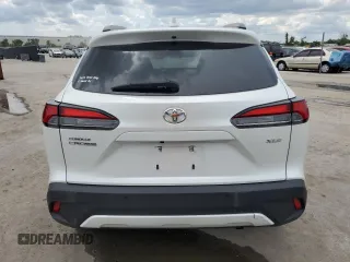 2023 Toyota Corolla Cross XLE z VIN 7MUDAAAG7PV051492, wystawiony jako Copart lot #61185635 z przebiegiem 79 364 mil mil oraz Nie do naprawy • Non repairable. Historia ofert i sprzedaży dostępna na DreamBid. Obrazek 6.
