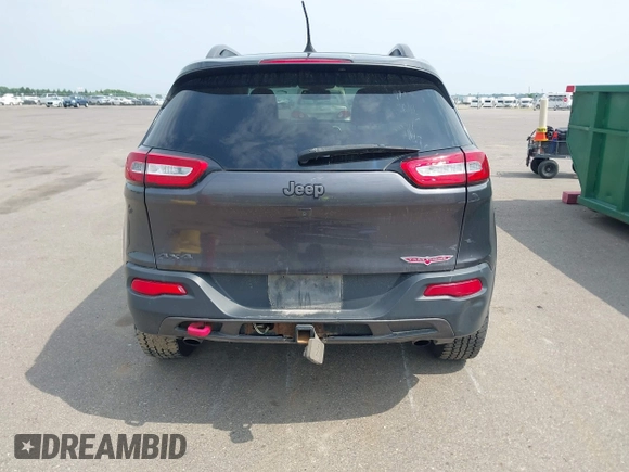 2016 Jeep Cherokee Trailhawk z VIN 1C4PJMBS1GW323434, wystawiony jako IAAI lot #42485364 z przebiegiem 130 351 mil mil oraz . Historia ofert i sprzedaży dostępna na DreamBid. Obrazek 17.