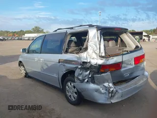2003 Honda Odyssey EX-L with VIN 5FNRL18973B007802, listed as a IAAI auction lot 40365765 with 278,759 mi miles and . Bid and sale history available at DreamBid. Image 3.
