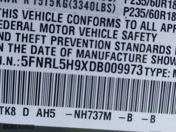 2013 Honda Odyssey Touring with VIN 5FNRL5H9XDB009973, listed as a IAAI auction lot 41904710 with 219,067 mi miles. Bid and sale history available at carsss.com. Image 9.