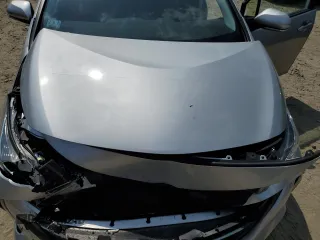 2022 Toyota Prius LE with VIN JTDKAMFP2N3210252, listed as a Copart auction lot 60030335 with 93,325 mi miles and Salvage title. Bid and sale history available at DreamBid. Image 11.