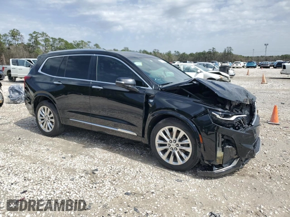 2020 Cadillac XT6 FWD Premium Luxury with VIN 1GYKPCRSXLZ104502, listed as a Copart auction lot 47808125 with 97,053 mi miles and Salvage Title. Bid and sale history available at carsss.com. Image 4.
