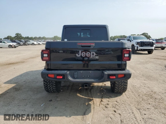 2020 Jeep Gladiator Rubicon with VIN 1C6JJTBG2LL166964, listed as a Copart auction lot 58041945 with 62,716 mi miles and Salvage title. Bid and sale history available at DreamBid. Image 6.