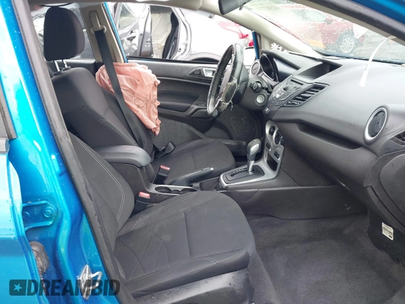 2015 Ford Fiesta SE z VIN 3FADP4EJ9FM133020, wystawiony jako IAAI lot #42302738 z przebiegiem 115 669 mil mil oraz . Historia ofert i sprzedaży dostępna na DreamBid. Obrazek 5.