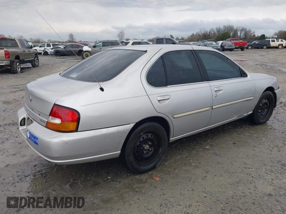 1999 Nissan Altima XE with VIN 1N4DL01D5XC180276, listed as a IAAI auction lot 41584645 with 248,376 mi miles. Bid and sale history available at carsss.com. Image 4.