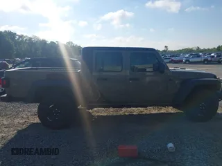 2020 Jeep Gladiator Sport S with VIN 1C6HJTAG0LL216406, listed as a IAAI auction lot 41991629 with 180,125 mi miles and . Bid and sale history available at DreamBid. Image 13.