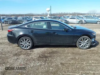 2021 Mazda 6 Signature with VIN JM1GL1XY7M1615149, listed as a IAAI auction lot 41851158 with 47,690 mi miles and . Bid and sale history available at DreamBid. Image 14.