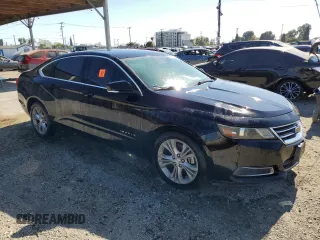 2014 Chevrolet Impala LT with VIN 2G1115SL2E9245975, listed as a Copart auction lot 56395655 with Not Provided miles and Clean Title. Bid and sale history available at DreamBid. Image 4.