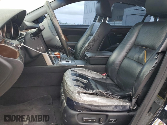 2005 Acura RL z VIN JH4KB16535C018850, wystawiony jako Copart lot #59306055 z przebiegiem 131 881 mil mil oraz Szkoda całkowita • Salvage title. Historia ofert i sprzedaży dostępna na DreamBid. Obrazek 7.
