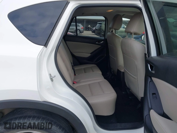 2013 Mazda CX-5 Grand Touring with VIN JM3KE2DEXD0166115, listed as a IAAI auction lot 41919164 with 102,999 mi miles and . Bid and sale history available at carsss.com. Image 8.