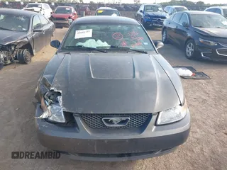 2003 Ford Mustang Standard z VIN 1FAFP40463F341216, wystawiony jako IAAI lot #42601357 z przebiegiem 145 520 mil mil oraz . Historia ofert i sprzedaży dostępna na DreamBid. Obrazek 12.