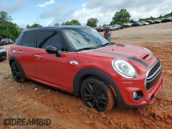 2015 MINI Hardtop 4 Door S z VIN WMWXU3C5XF2B56037, wystawiony jako Copart lot #56588425 z przebiegiem 149 210 mil mil oraz Szkoda całkowita • Salvage title. Historia ofert i sprzedaży dostępna na DreamBid. Obrazek 4.