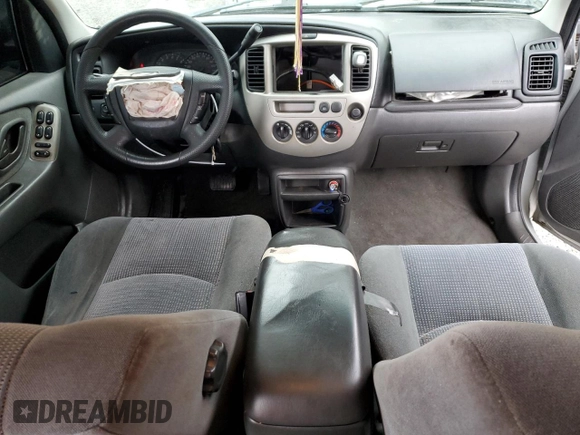 2003 Mazda Tribute LX with VIN 4F2YZ04153KM20941, listed as a Copart auction lot 82683264 with 195,240 mi miles and Salvage Title. Bid and sale history available at DreamBid. Image 8.