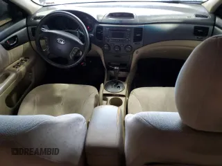 2009 Kia Optima LX z VIN KNAGE228595302847, wystawiony jako Copart lot #59187765 z przebiegiem 235 667 mil mil oraz Czysty tytuł • Clean title. Historia ofert i sprzedaży dostępna na DreamBid. Obrazek 8.