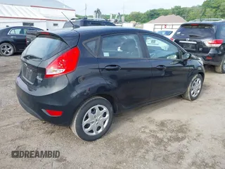 2013 Ford Fiesta SE z VIN 3FADP4EJ0DM149488, wystawiony jako IAAI lot #42373815 z przebiegiem 195 835 mil mil oraz . Historia ofert i sprzedaży dostępna na DreamBid. Obrazek 4.