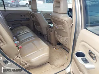 2005 Honda Pilot EX-L with VIN 5FNYF18515B010116, listed as a IAAI auction lot 41762150 with 217,954 mi miles. Bid and sale history available at carsss.com. Image 8.