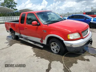 1999 Ford F-150 XL with VIN 2FTRX17L1XCB22247, listed as a Copart auction lot 60851965 with Not provided miles and Salvage title. Bid and sale history available at DreamBid. Image 4.
