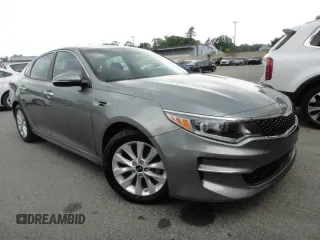 2017 Kia Optima EX z VIN 5XXGU4L39HG1773XX, wystawiony jako Copart lot #60344455 z przebiegiem 28 500 mil mil oraz Czysty tytuł • Clean title. Historia ofert i sprzedaży dostępna na DreamBid. Obrazek 1.