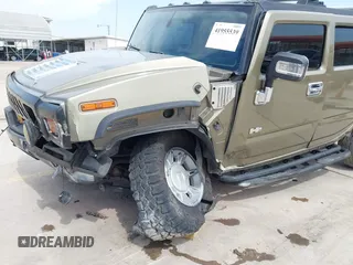 2006 Hummer H2 with VIN 5GRGN23U56H102574, listed as a IAAI auction lot 41955539 with 202,102 mi miles. Bid and sale history available at carsss.com. Image 6.