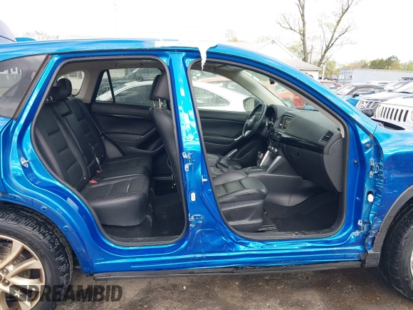 2013 Mazda CX-5 Grand Touring with VIN JM3KE4DE4D0123837, listed as a IAAI auction lot 42031074 with 121,818 mi miles. Bid and sale history available at carsss.com. Image 14.