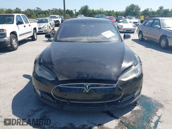 2014 Tesla Model S P85D with VIN 5YJSA1H25EFP65571, listed as a IAAI auction lot 42185442 with 115,990 mi miles and . Bid and sale history available at DreamBid. Image 11.