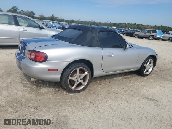 2003 Mazda MX-5 Miata Cloth with VIN JM1NB353430304103, listed as a Copart auction lot 50574245 with Not provided miles and Salvage title. Bid and sale history available at DreamBid. Image 3.