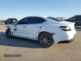 2022 Genesis G70 3.3T with VIN KMTG54TE5NU094831, listed as a Copart auction lot 83879004 with 57,449 mi miles and Salvage Title. Bid and sale history available at DreamBid. Image 2.