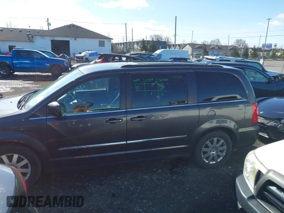 2016 Chrysler Town & Country Touring with VIN 2C4RC1BG5GR207496, listed as a IAAI auction lot 41908883 with 68,910 mi miles. Bid and sale history available at carsss.com. Image 14.