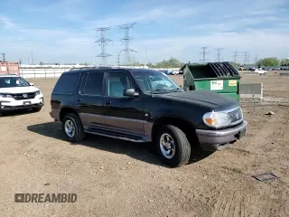 1997 Mercury Mountaineer with VIN 4M2DU55P5VUJ62435, listed as a Copart auction lot 60163465 with 105,646 mi miles and Salvage title. Bid and sale history available at DreamBid. Image 14.