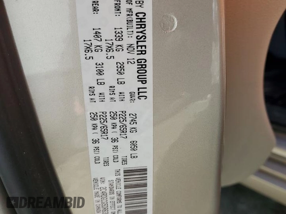 2013 Dodge Grand Caravan SXT with VIN 2C4RDGCG5DR635014, listed as a Copart auction lot 49552925 with 194,929 mi miles and Clean Title. Bid and sale history available at DreamBid. Image 13.