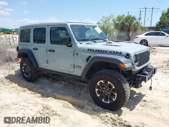 2024 Jeep Wrangler Rubicon with VIN 1C4PJXFG3RW295565, listed as a IAAI auction lot 42026211 with 5,661 mi miles. Bid and sale history available at carsss.com. Image 14.