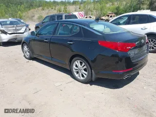 2011 Kia Optima EX with VIN KNAGN4A71B5139155, listed as a IAAI auction lot 42048976 with 130,400 mi miles. Bid and sale history available at carsss.com. Image 3.