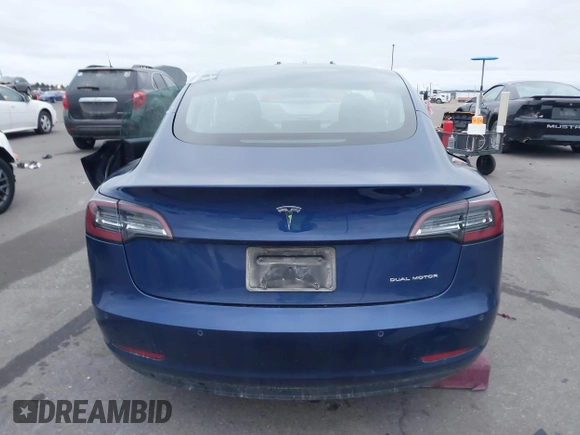 2021 Tesla Model 3 Long Range with VIN 5YJ3E1EB8MF848049, listed as a IAAI auction lot 40974331 with 61,462 mi miles. Bid and sale history available at carsss.com. Image 16.