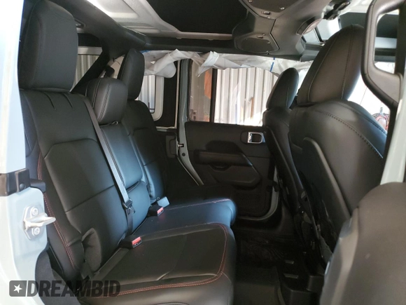 2024 Jeep Wrangler Rubicon X with VIN 1C4RJXFG5RW287542, listed as a Copart auction lot 72682924 with 5,792 mi miles and Salvage title. Bid and sale history available at DreamBid. Image 11.