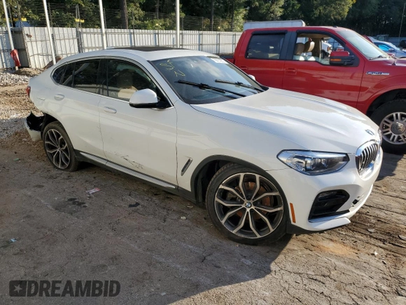 2020 BMW X4 xDrive30i with VIN 5UX2V1C05L9B34564, listed as a Copart auction lot 70014203 with 0 mi miles. Bid and sale history available at carsss.com. Image 4.