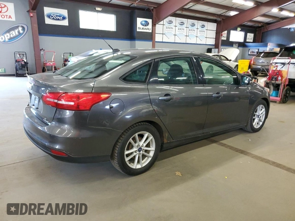 2015 Ford Focus SE with VIN 1FADP3F2XFL249619, listed as a Copart auction lot 63705825 with 118,573 mi miles and Clean title. Bid and sale history available at DreamBid. Image 3.