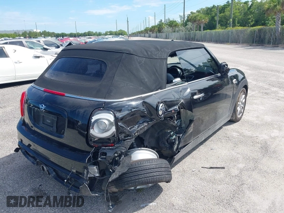 2021 MINI Convertible Cooper S z VIN WMWWJ5C0XM3M08622, wystawiony jako IAAI lot #42507679 z przebiegiem 36 932 mil mil oraz . Historia ofert i sprzedaży dostępna na DreamBid. Obrazek 4.