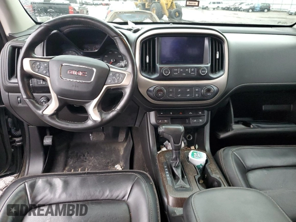 2017 GMC Canyon 4WD Denali with VIN 1GTG6EEN7H1284618, listed as a Copart auction lot 79315703 with 89,746 mi miles and Salvage Title. Bid and sale history available at carsss.com. Image 8.